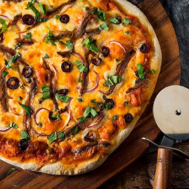 Pizza casera con anchoas. Foto: Bigstock