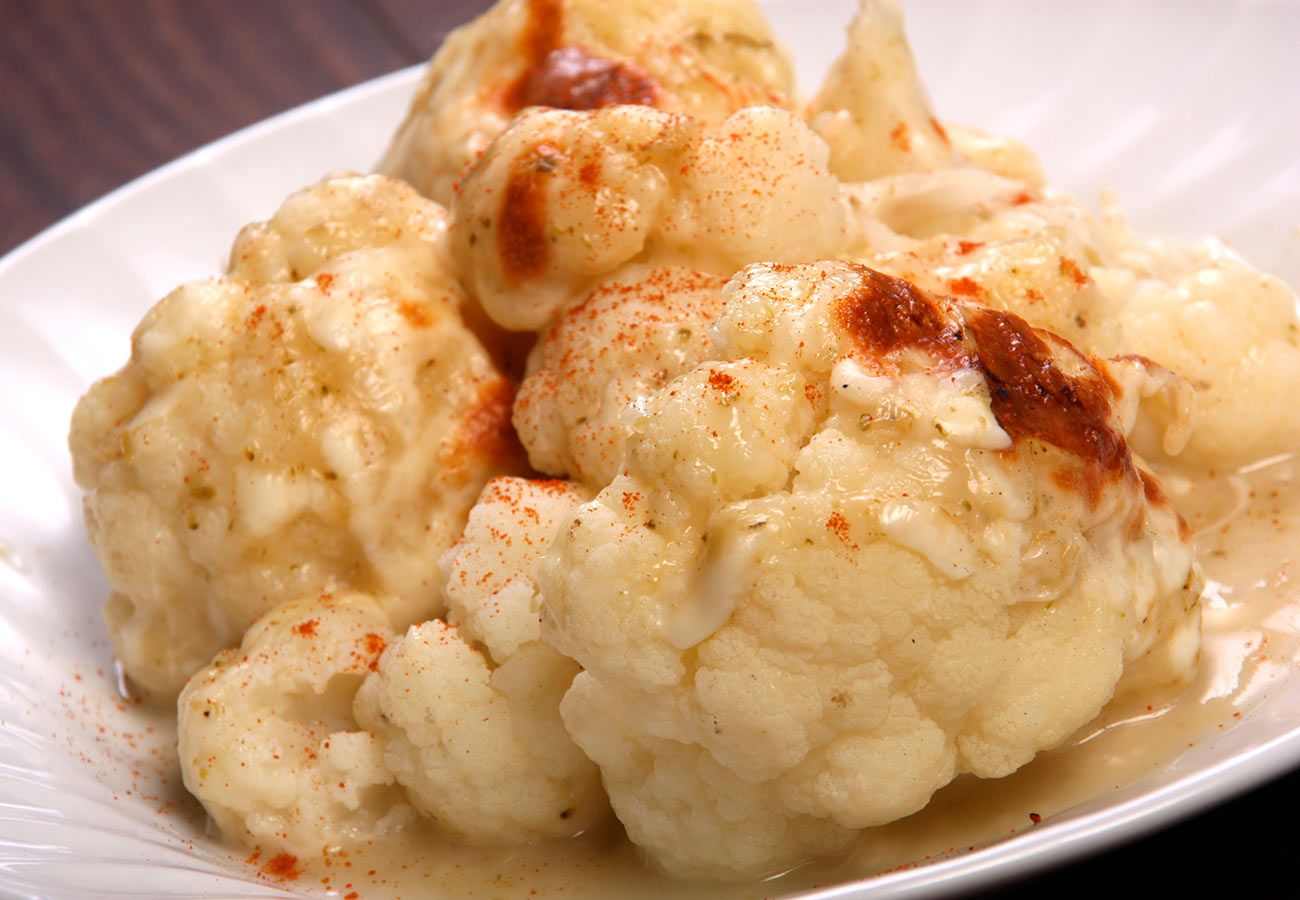 Coliflor gratinada con bechamel y pimentón de Murcia