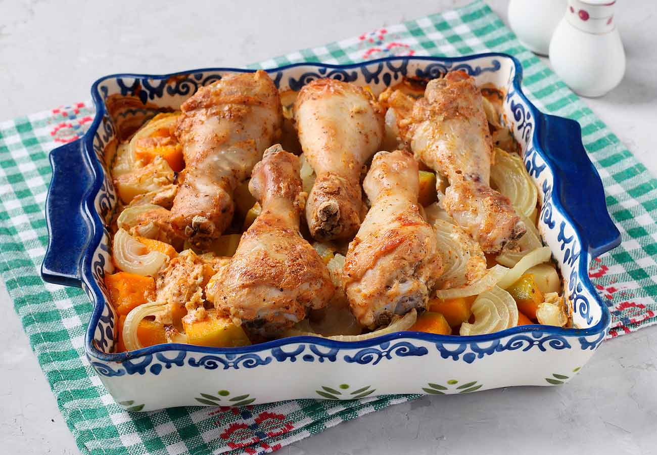 Muslitos de pollo al horno con calabaza, patata y cebolla