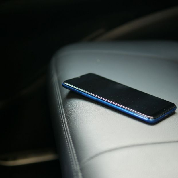 bigstock Forget Smartphone On Car Sit  462433887