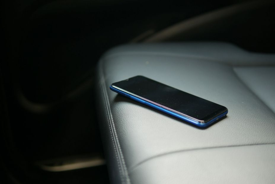bigstock Forget Smartphone On Car Sit 462433887 bigstock Forget Smartphone On Car Sit 462433887