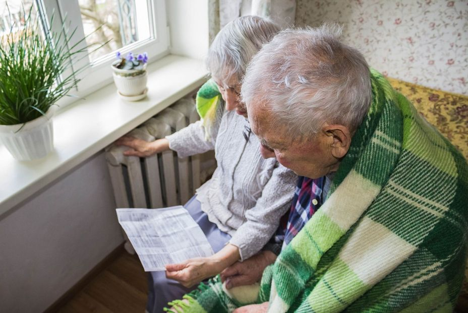 bigstock The Senior Woman Holding Gas B 291227731