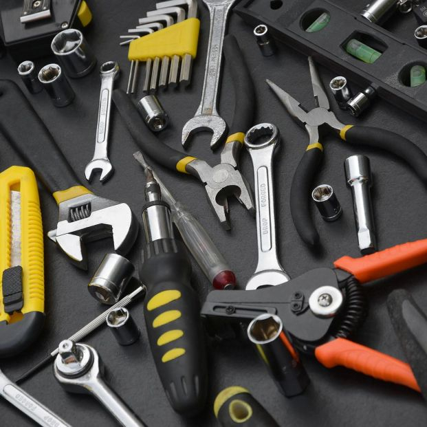 bigstock Handyman Tool Kit On Black Woo 410646433