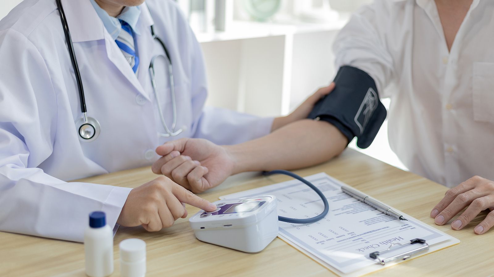 bigstock Male doctor uses a blood press 446303957 (1)