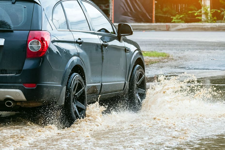 bigstock Car Passing Through A Flooded 462472741 bigstock Car Passing Through A Flooded 462472741