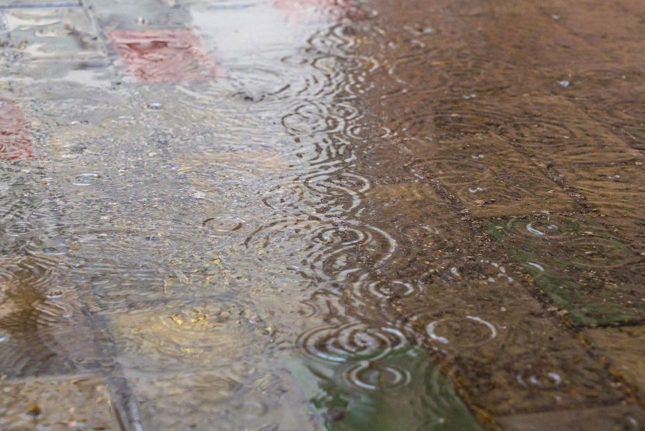 bigstock Rain Drops In The Water Aqua  458088123