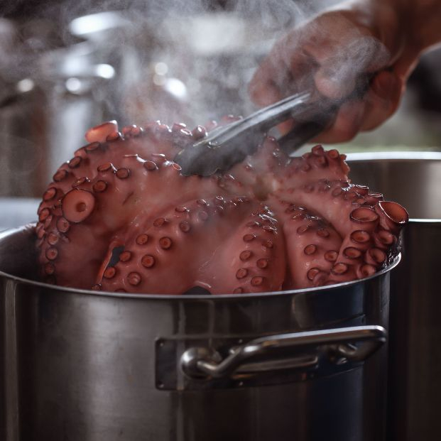 bigstock Whole Octopus Boiling In The T 438153269