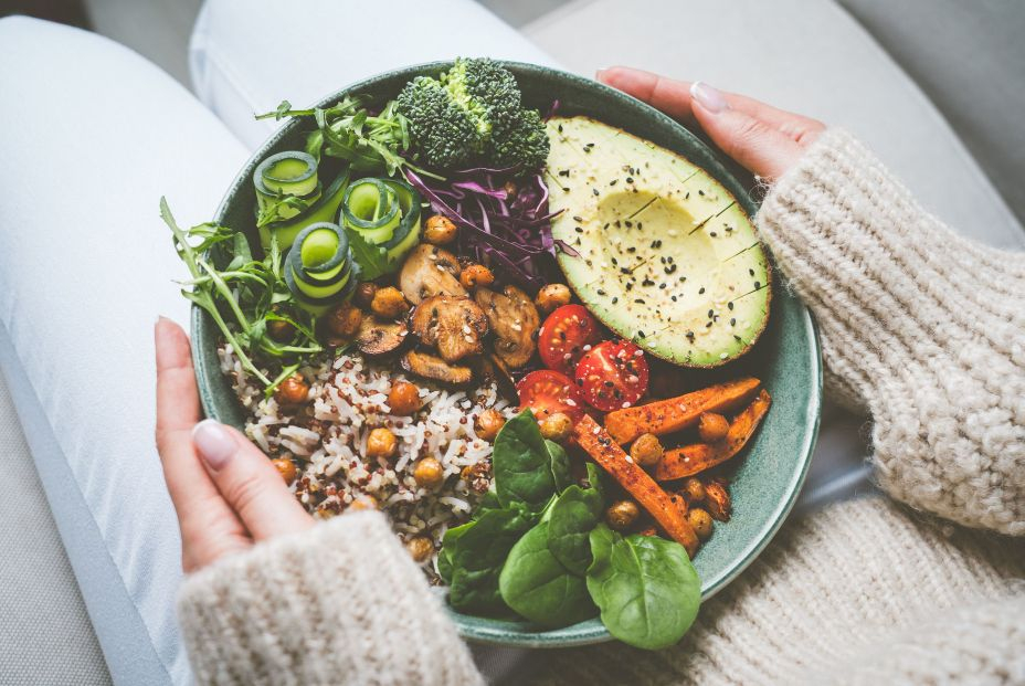 bigstock Woman With Healthy Meal Bowl  452205419