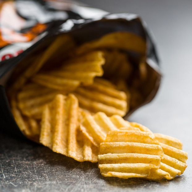 bigstock Crinkle cut potato chips on ol 132107657
