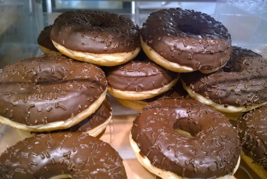 bigstock Donuts With Black Chocolate Gl 443506943