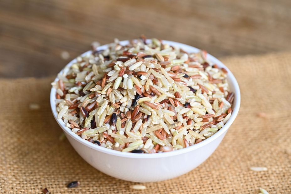 bigstock Brown Rice On White Bowl  Raw 460537785