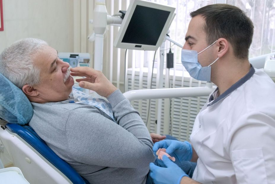 bigstock Elderly Man Sitting In Dentist 453211929