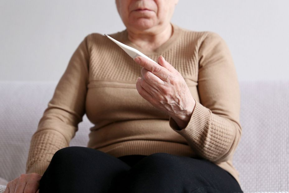bigstock Elderly Woman Measuring Body T 418485736