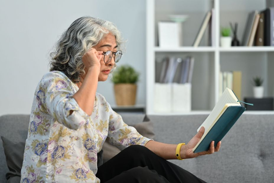 bigstock Elderly Woman Trying To Read B 470219791