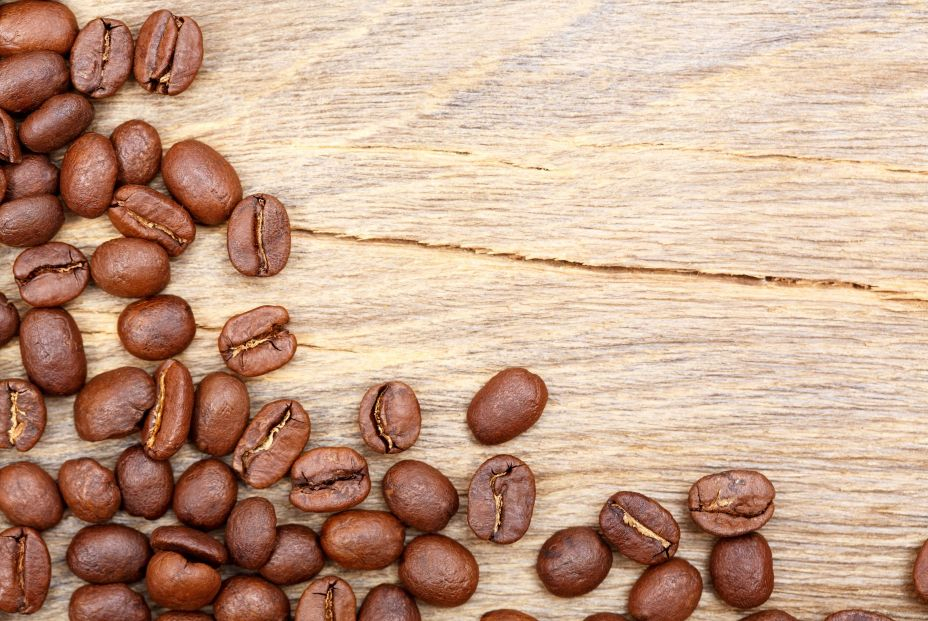 bigstock Black Coffee Beans Seed Scatte 472172563
