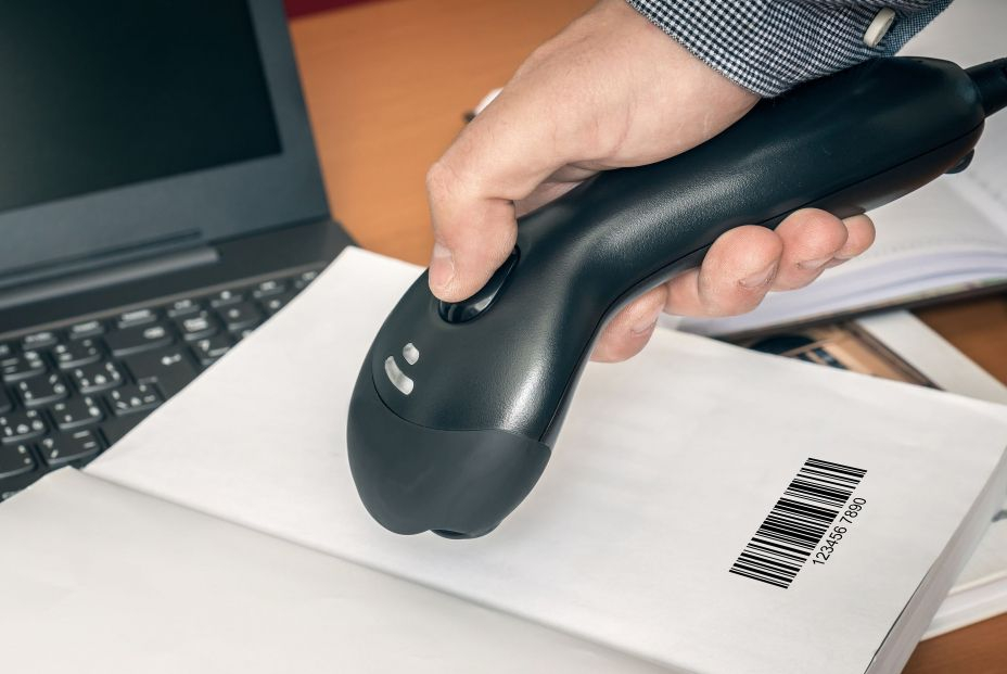 bigstock Man With Scanner Scans Barcode 369457426 bigstock Man With Scanner Scans Barcode 369457426