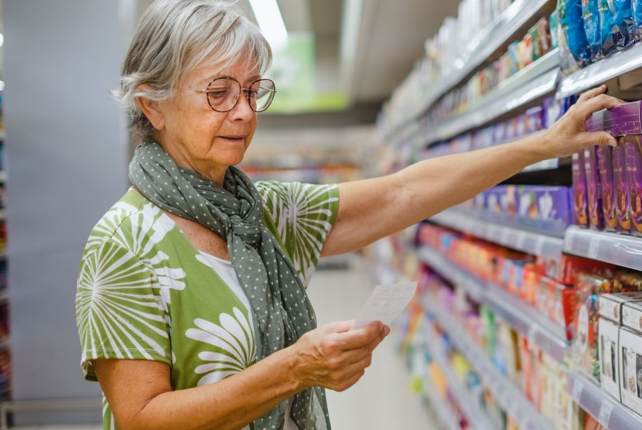 bigstock Senior Woman Selecting Grocery 464665491