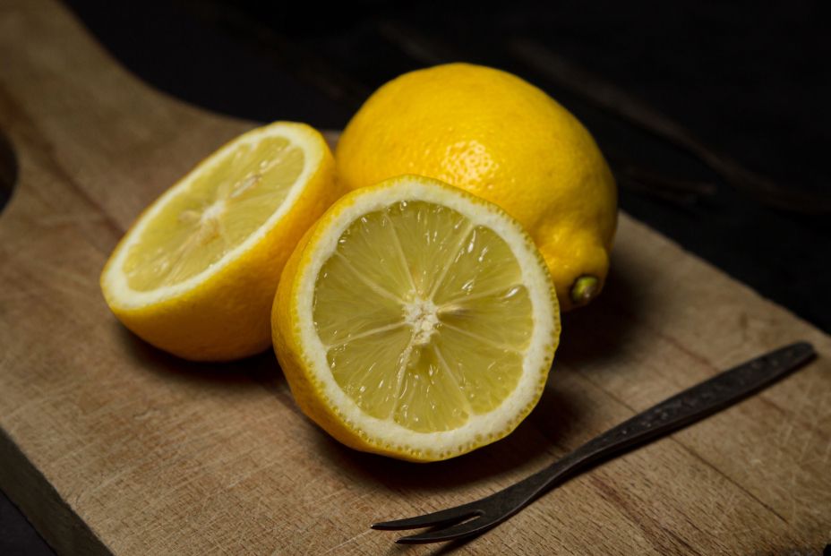 bigstock Lemon On A Wooden Board On A B 463841399