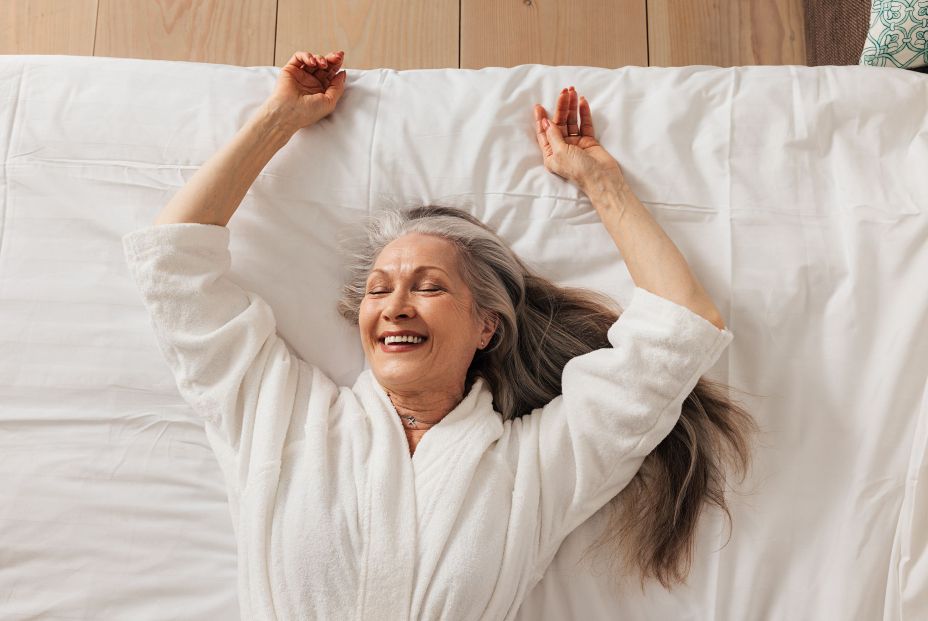 bigstock Happy Aged Woman In A Bathrobe 468568145