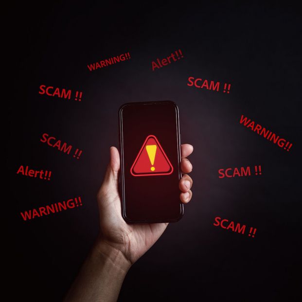 bigstock Scam Alert On Smartphone Conce 471026307