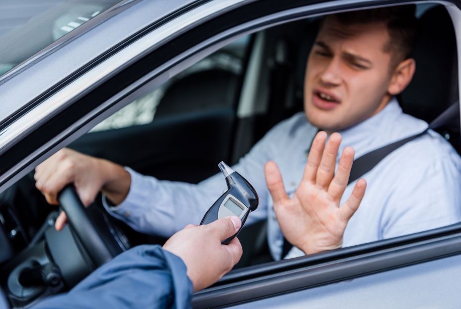 bigstock Policeman Giving Breathalyzer  401217662