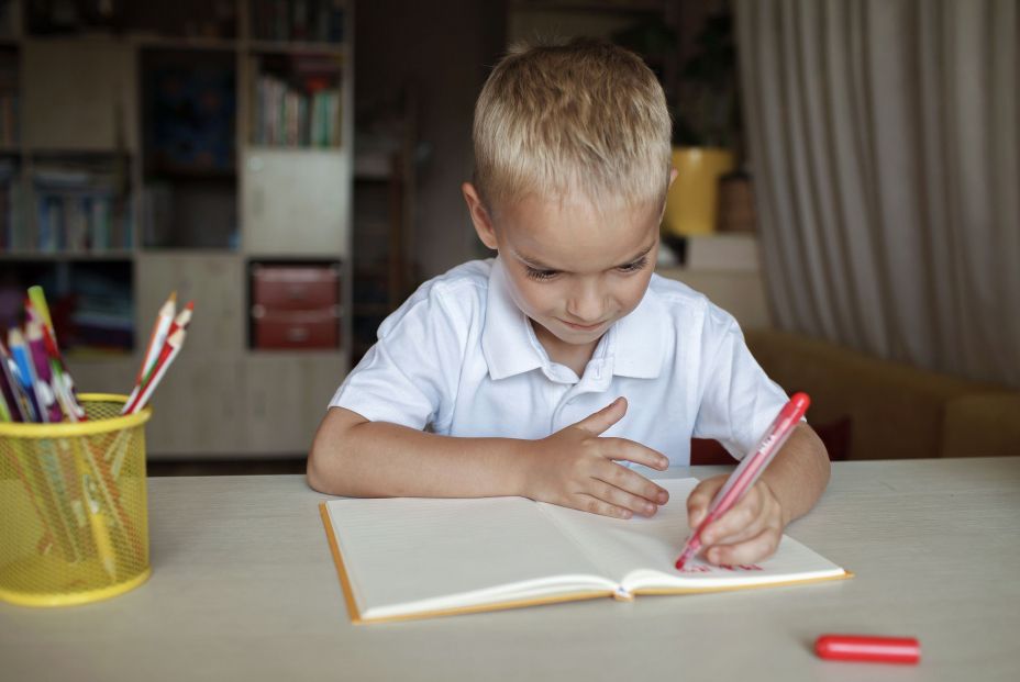 bigstock Happy Left handed Boy Writing 427444814 bigstock Happy Left handed Boy Writing 427444814