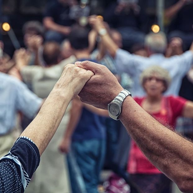 bigstock Senior People Holding Hands An 86962343