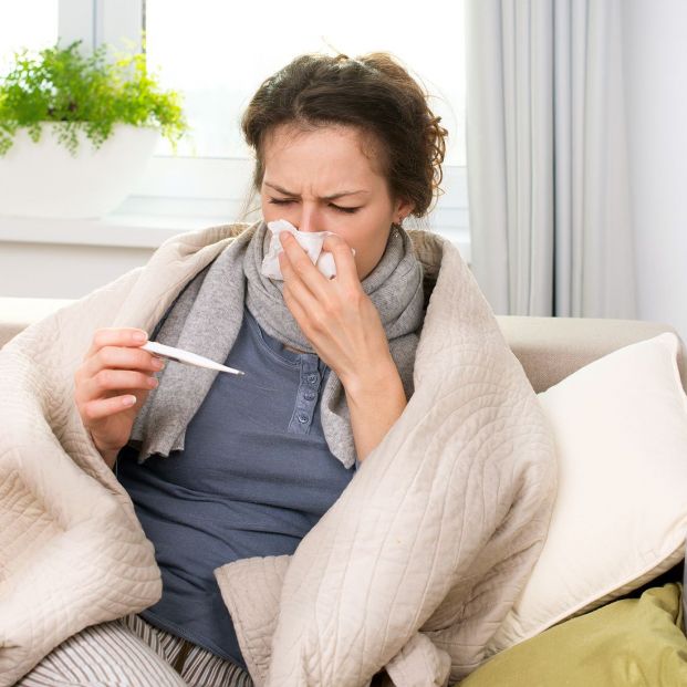 bigstock Sick Woman with Thermometer Fl 39028705