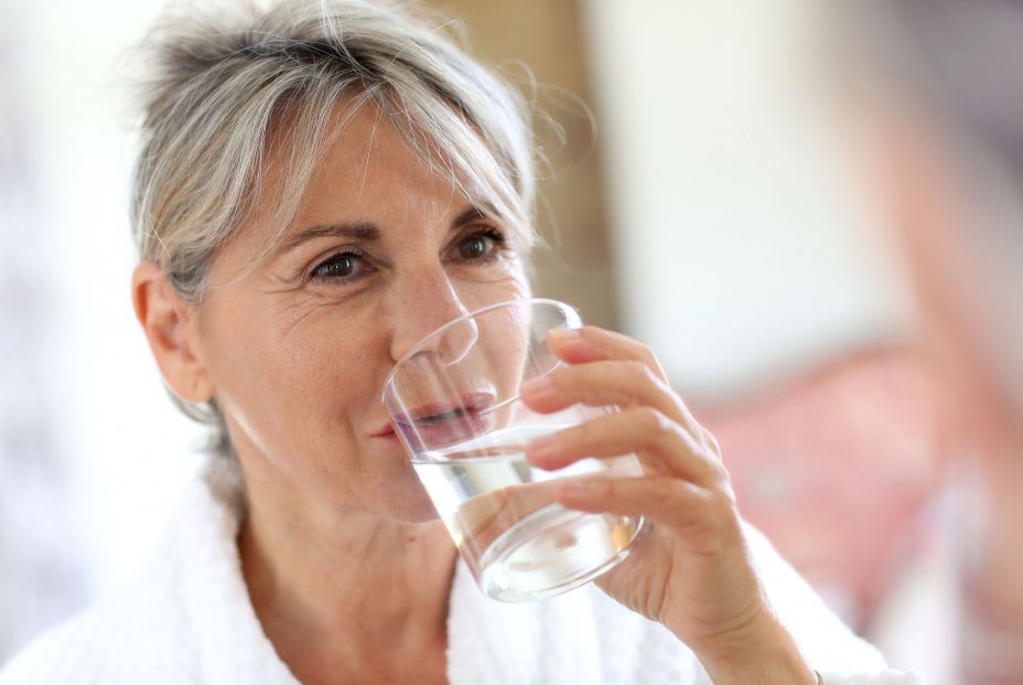bigstock Senior woman drinking water in 51464419