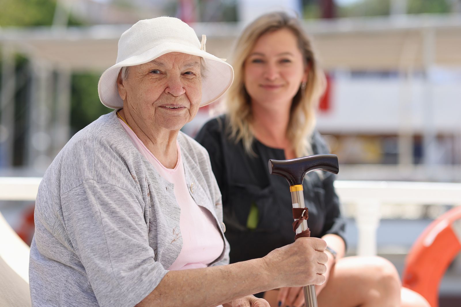 bigstock Elderly Woman With Cane Sits W 455313943 bigstock Elderly Woman With Cane Sits W 455313943