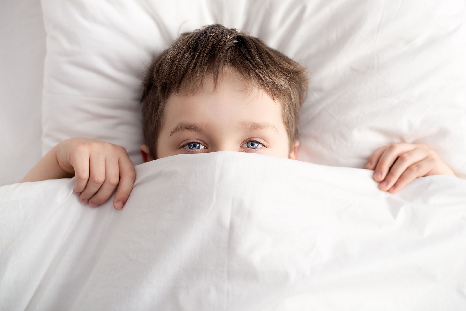 bigstock Little Boy In Bed Covering His 120298484 bigstock Little Boy In Bed Covering His 120298484