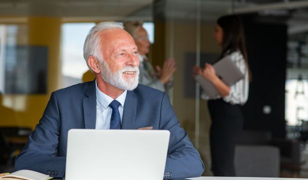 bigstock Senior Businessman Working On  474618199