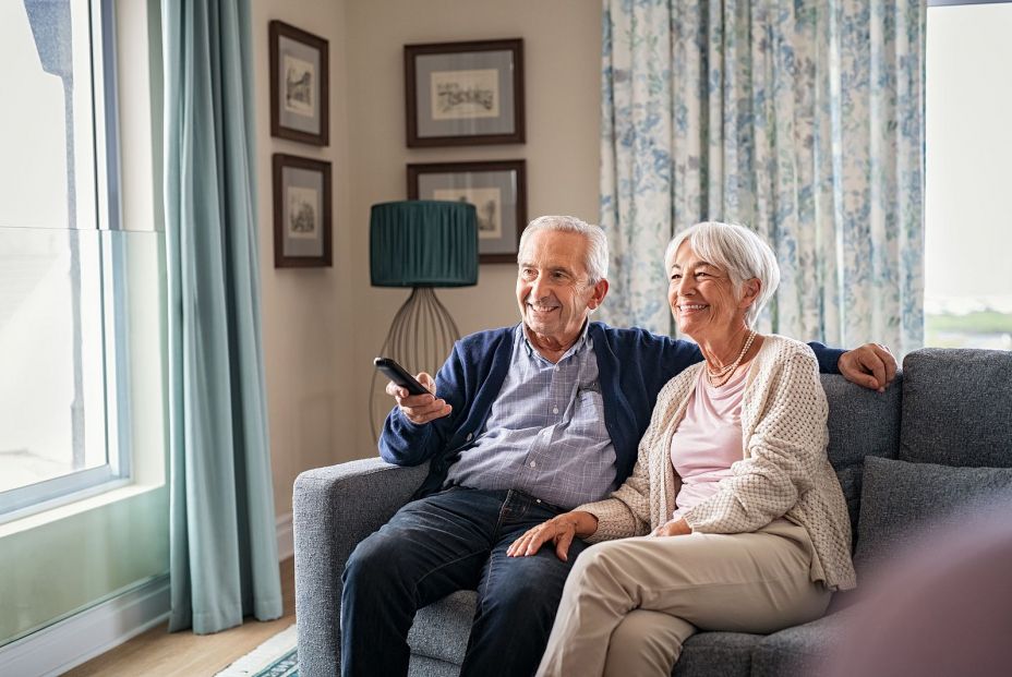 bigstock Happy senior couple using remo 420505606