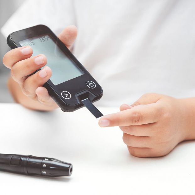 bigstock Young Boy Using Glucometer Ch 387905992 bigstock Young Boy Using Glucometer Ch 387905992