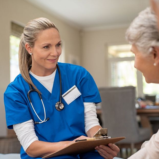 bigstock Happy nurse talking to senior 269124460 bigstock Happy nurse talking to senior 269124460