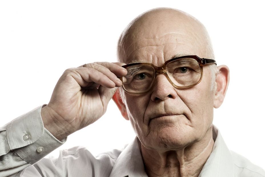 bigstock Elderly man with massive glass 13200092
