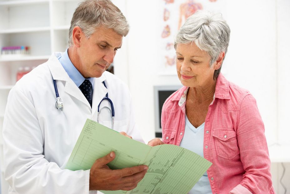 bigstock Doctor with female patient 21258452 bigstock Doctor with female patient 21258452
