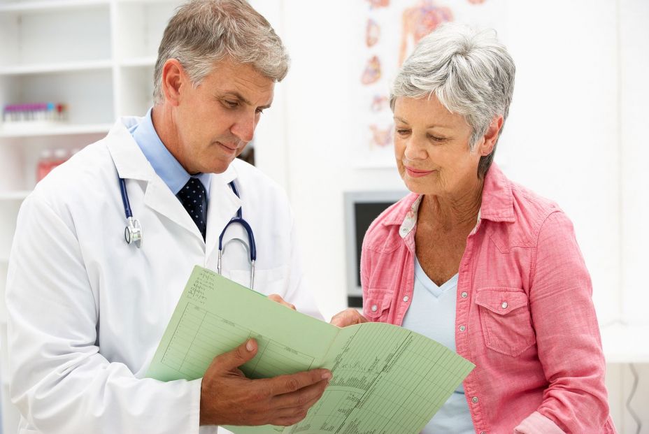 bigstock Doctor with female patient 21258452 bigstock Doctor with female patient 21258452