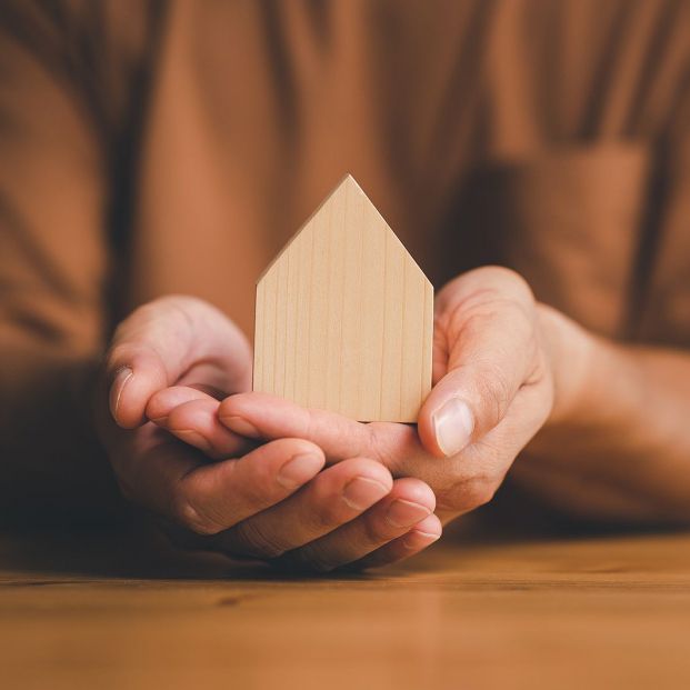 bigstock Hands Holding Wooden House Mod 431800901 bigstock Hands Holding Wooden House Mod 431800901