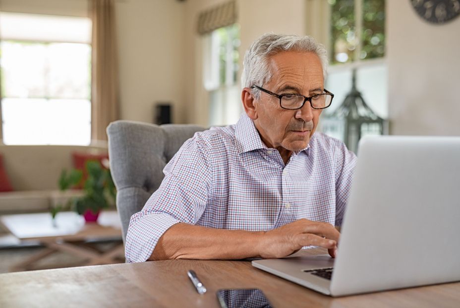 bigstock Senior man working with laptop 265286971
