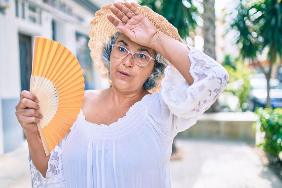 bigstock Middle age woman with grey hai 395369729