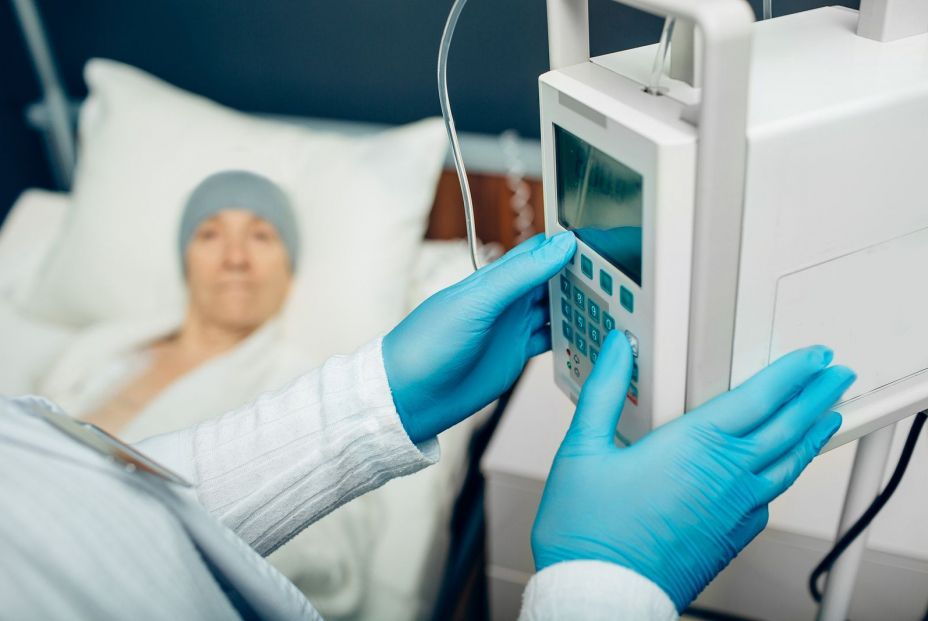 bigstock oncologist turning on device i 354790871 bigstock oncologist turning on device i 354790871