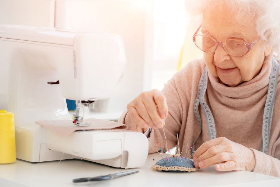 bigstock Lovely aged woman sewing at wo 360216280 bigstock Lovely aged woman sewing at wo 360216280