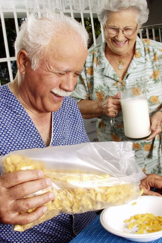 bigstock Grandparents eating cereal cor 29533994