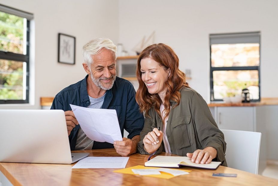 bigstock Mature smiling couple sitting 365289844 bigstock Mature smiling couple sitting 365289844