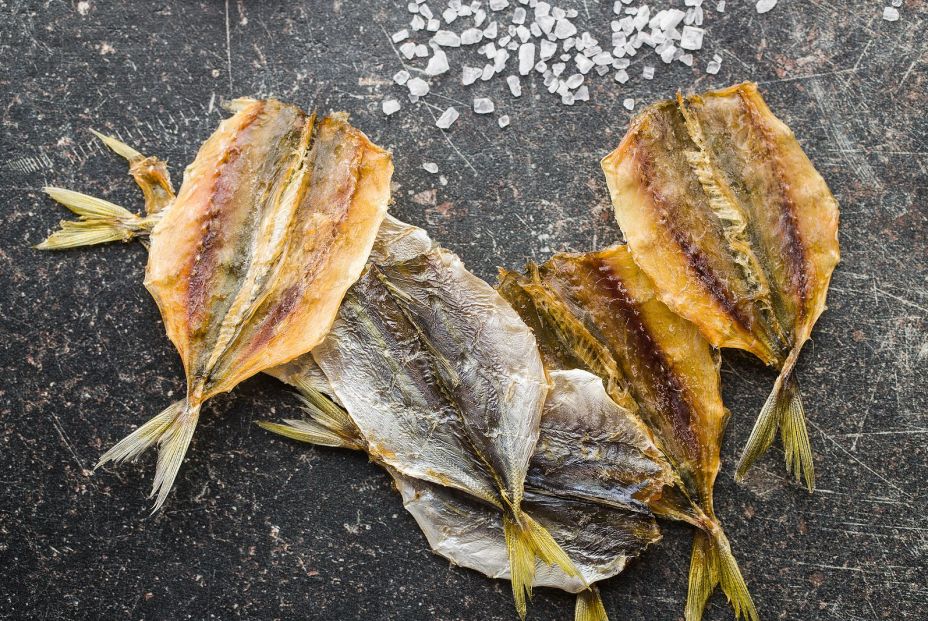 bigstock Dried salted fish on old kitch 224257846