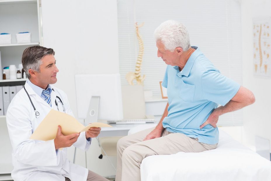 bigstock Male doctor discussing reports 84765227 bigstock Male doctor discussing reports 84765227