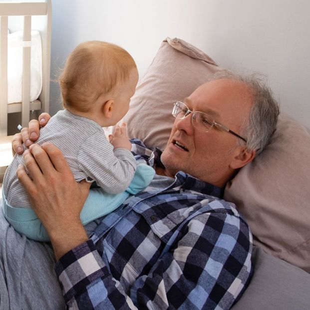 bigstock Little Red haired Baby Sitting 368224966