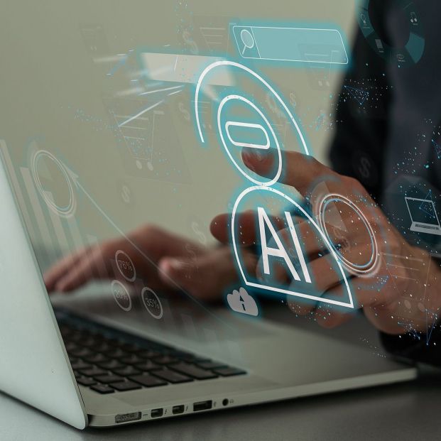 bigstock man using laptop or smartphone 477530527