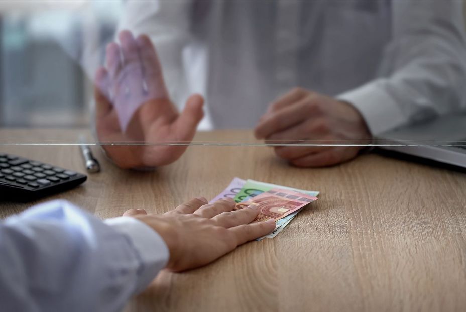 bigstock bank cashier refusing to chang 348172498 (2)